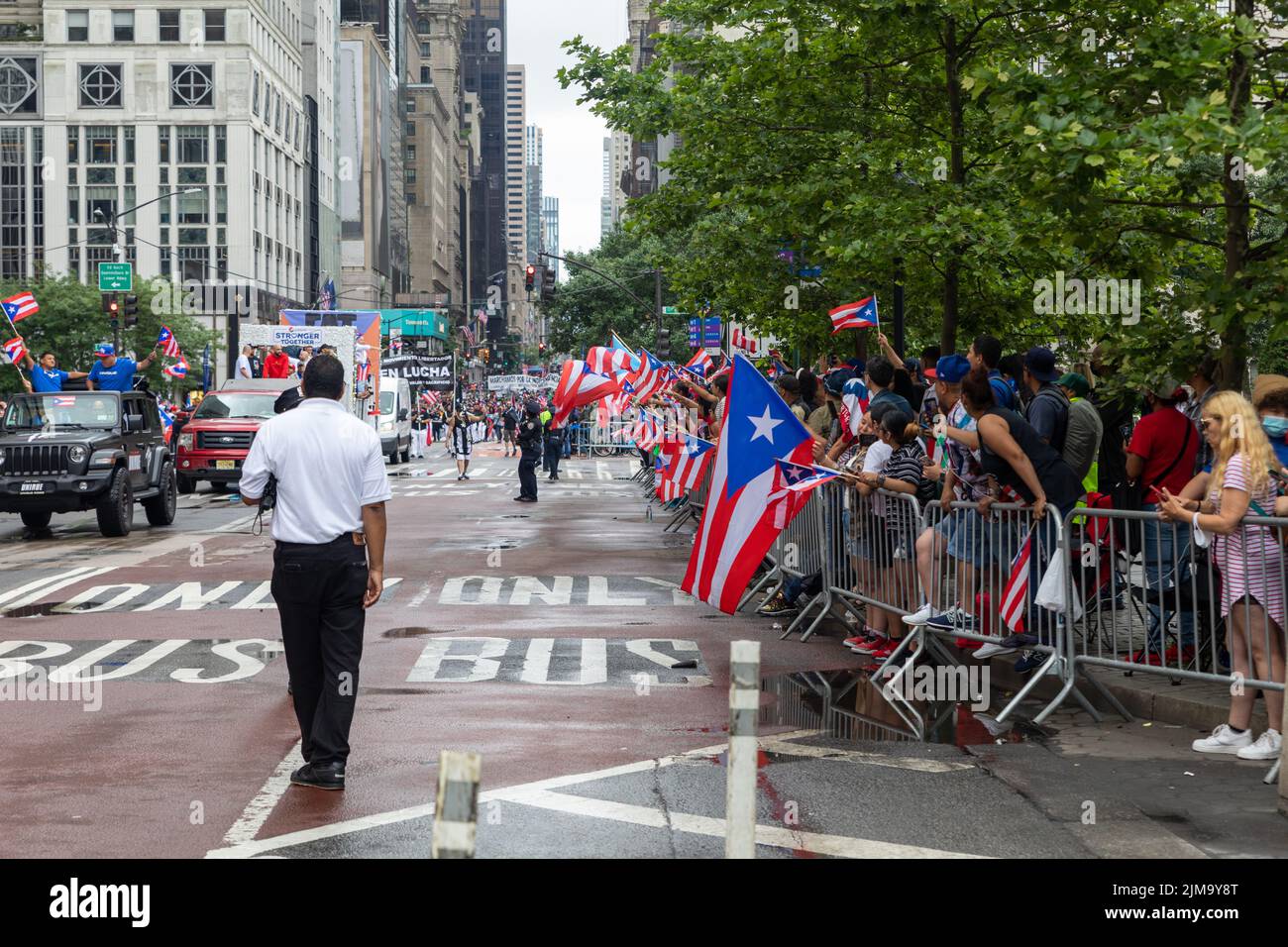 A group of people celebrating the Puerto Rican Day Parade in New York City, the USA Stock Photo