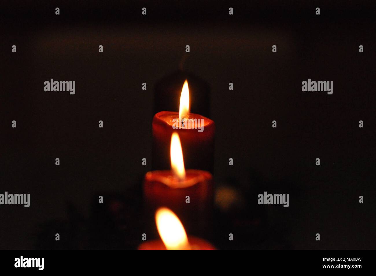 The three red candles for Advent in Germany Stock Photo Alamy