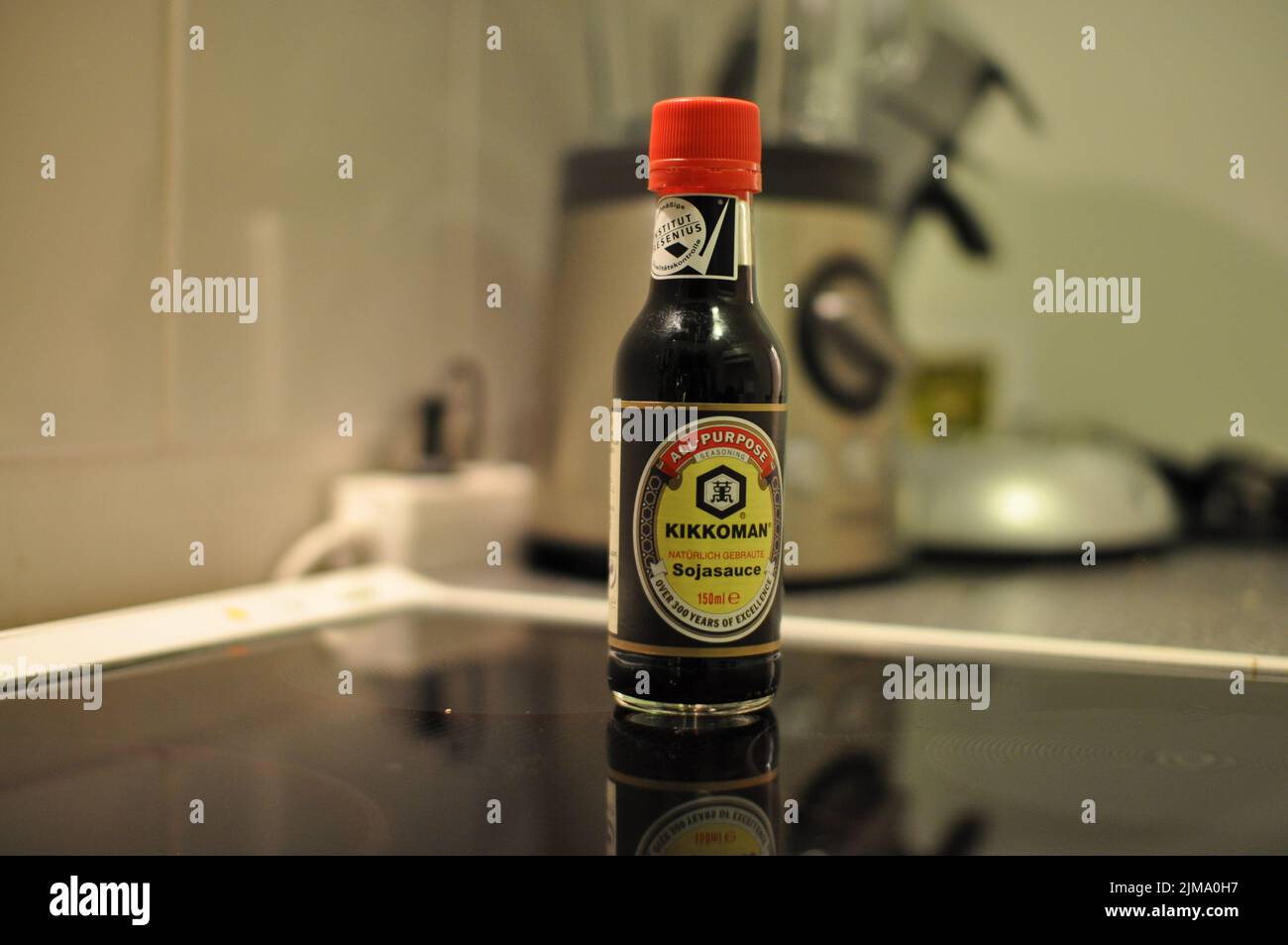 The famous Kikkoman Soy Sauce on a hot plate Stock Photo Alamy