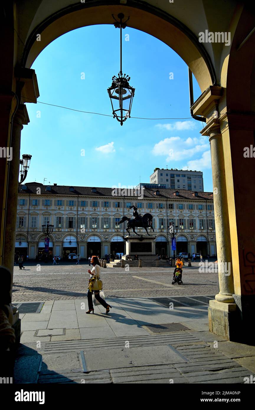 A glimpse from the arcade of picturesque baroque Saint Charles square