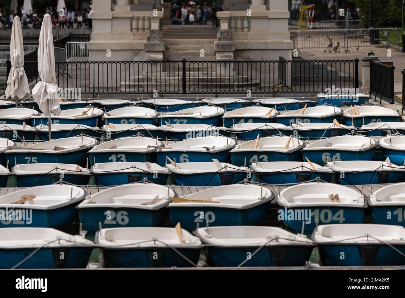 A group of rowing boats in the Retiro Park pond in Madrid, Spain Stock
