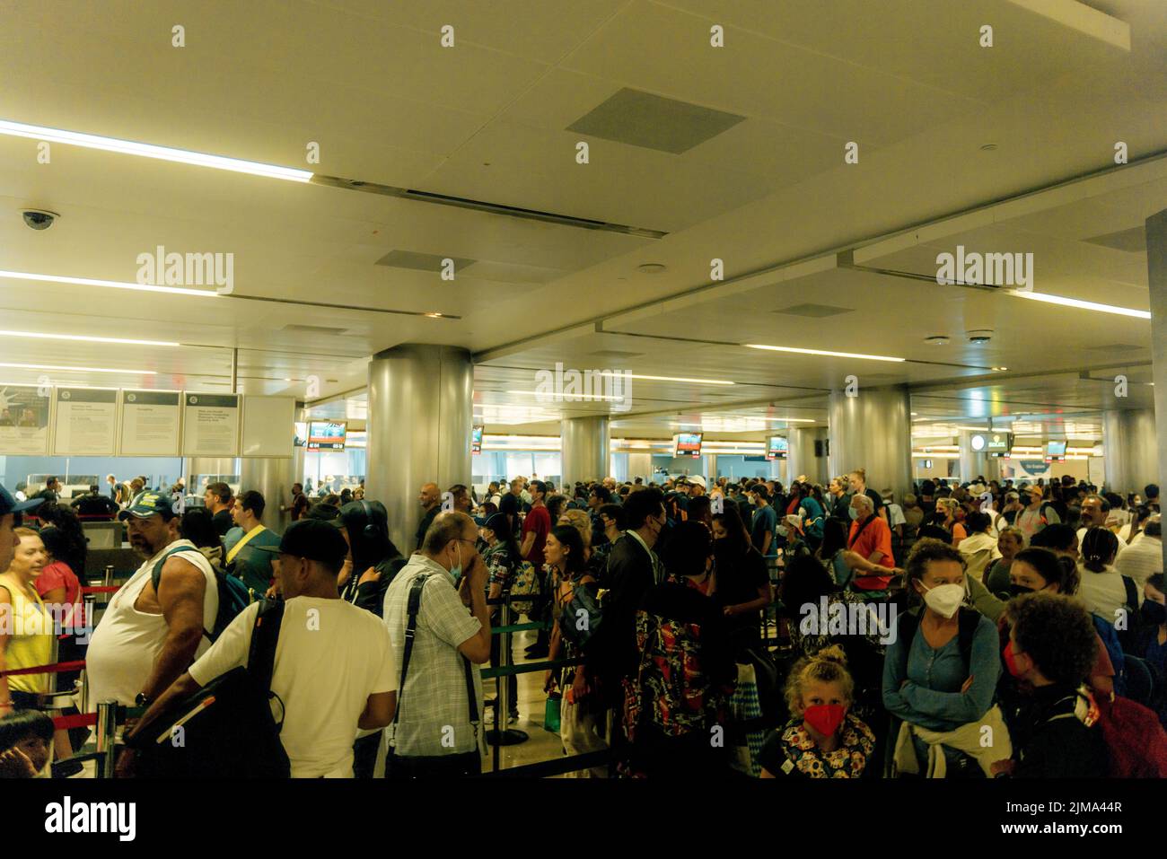 Staff shortages causing a massive bottleneck of people at Los Angeles International Airport entering trying to get through immigration & customs at LA Stock Photo