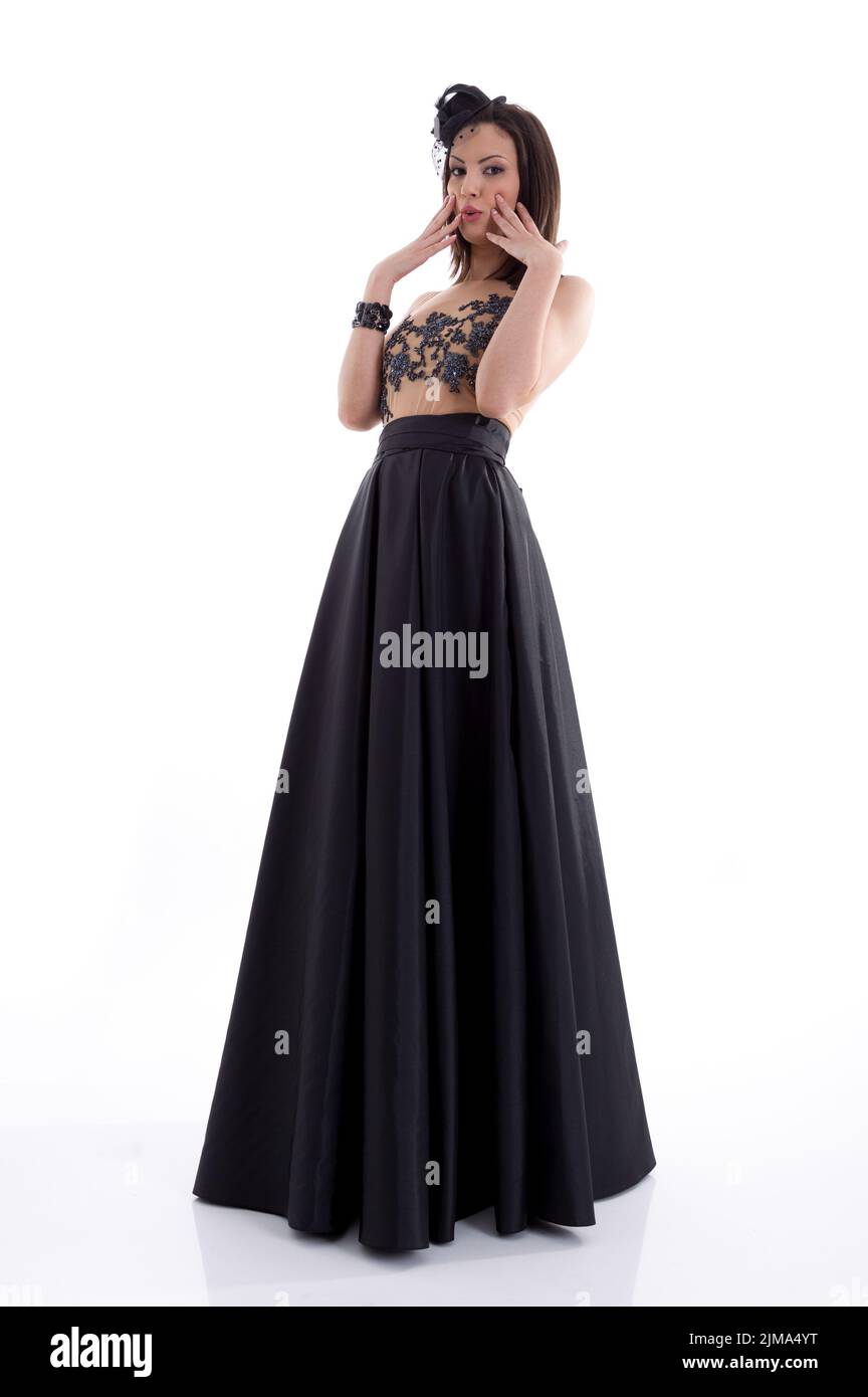 Beautiful woman model posing in elegant dress in the studio Stock Photo ...