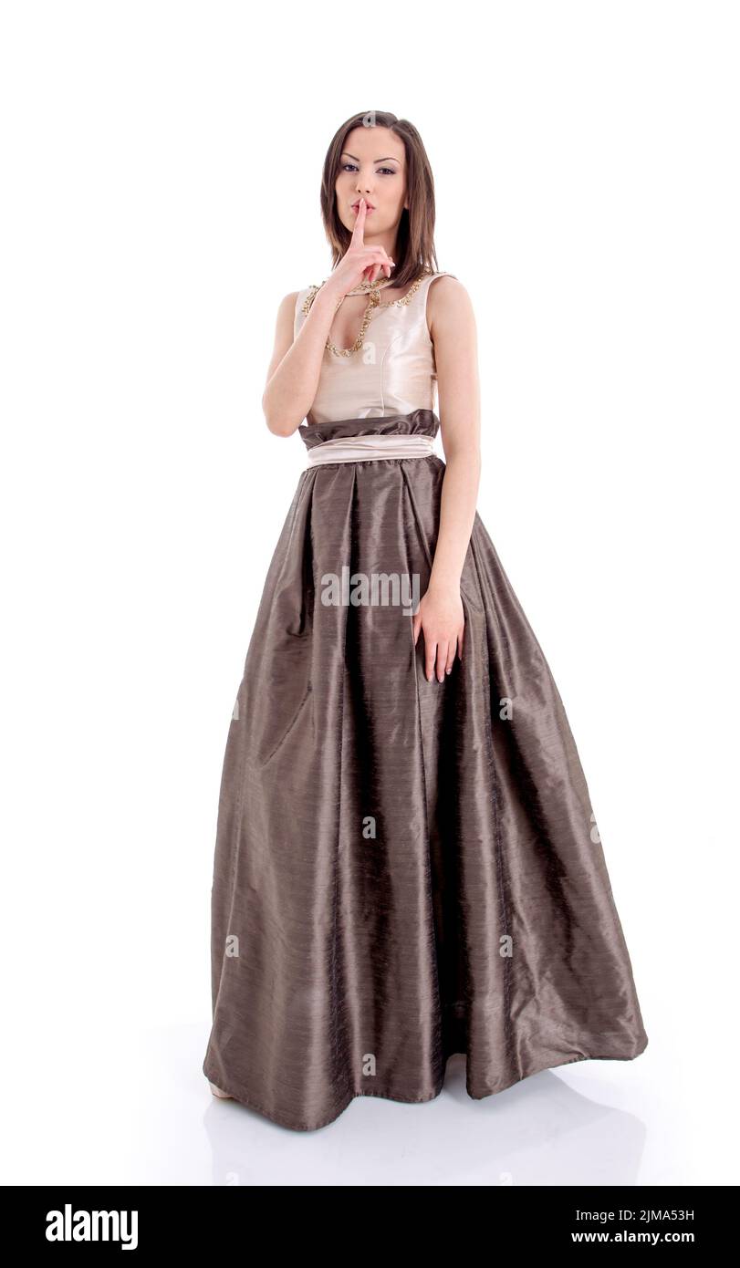 Beautiful woman model posing in elegant dress in the studio Stock Photo ...
