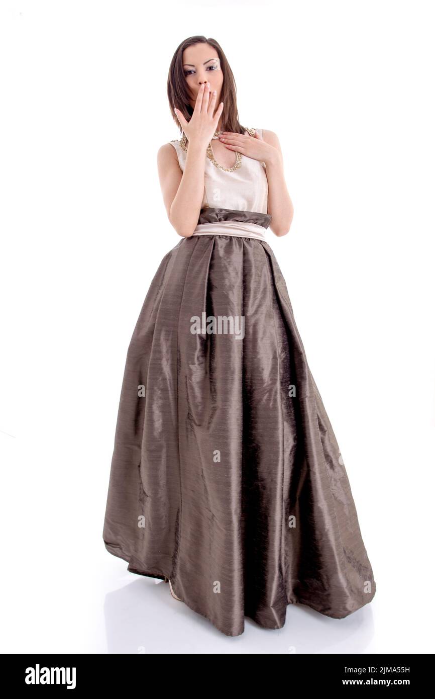 Beautiful woman model posing in elegant dress in the studio Stock Photo ...
