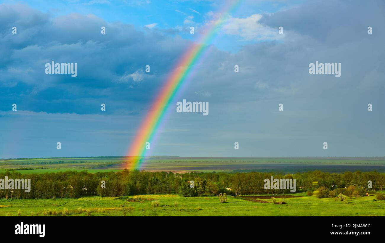 Rainbow over rural landscape hi-res stock photography and images - Alamy