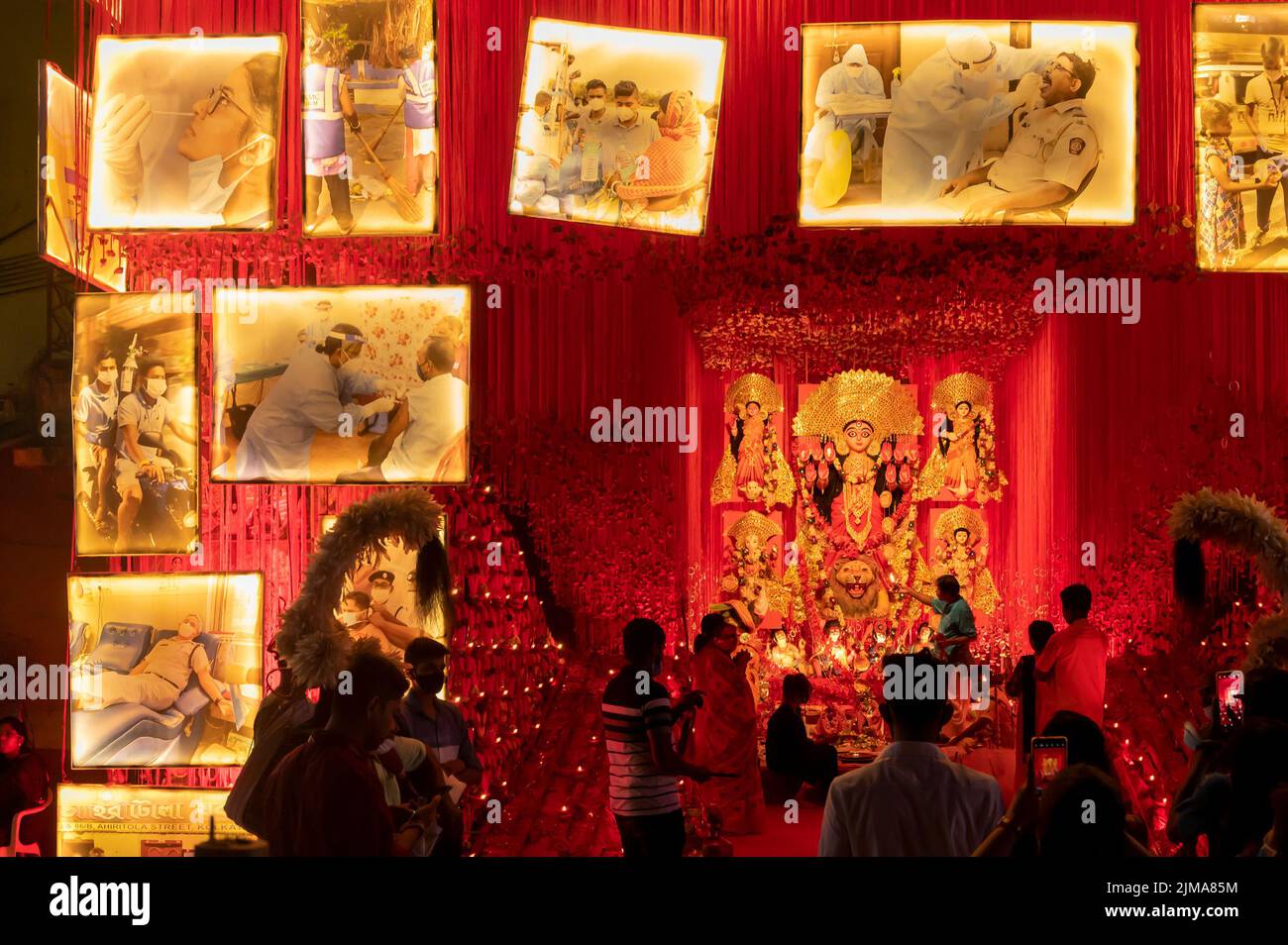 Kolkata, West Bengal, India - 12th October 2021 : Ahiritola Durga Puja, UNESCO Intangible cultural heritage of humanity. Devotees visiting decorated D Stock Photo