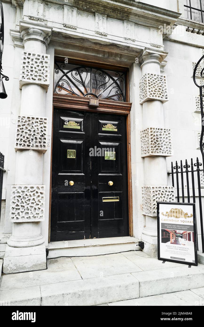 Entrance door to the King's Fund (president, HRH Prince of Wales) headquarters at the former convent school, Cavendish Square, London, England. Stock Photo
