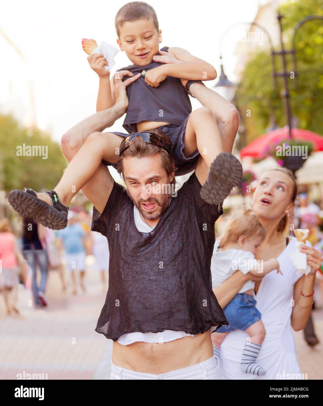 Suffering devoted parents kids Stock Photo