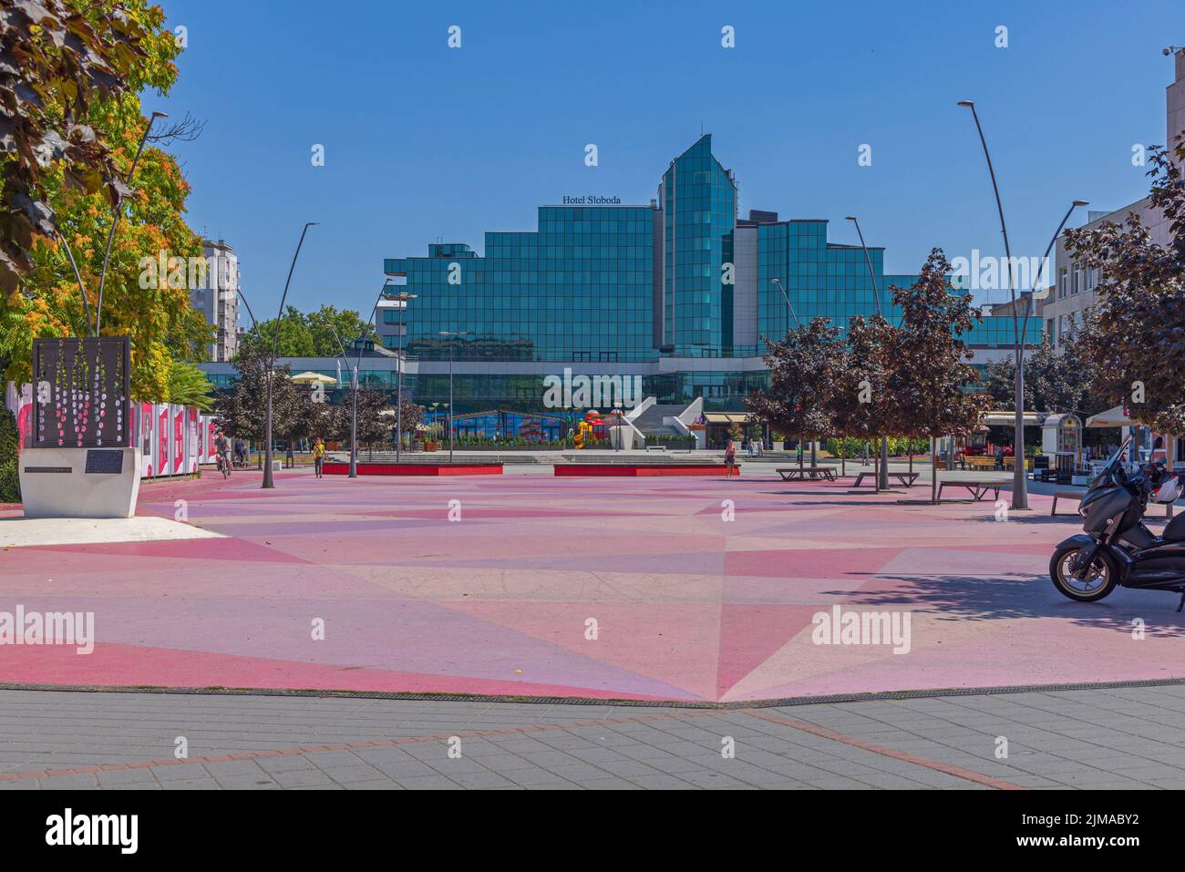 Sabac, Serbia - July 22, 2022: City Square Kids Playground Pedestrian Area With Modern Four Star Hotel Sloboda Freedom. Stock Photo