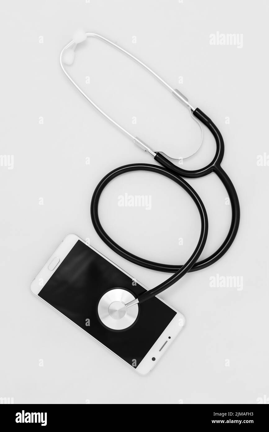 Medical stethoscope tool over the surface of a mobile smart phone Stock Photo Alamy