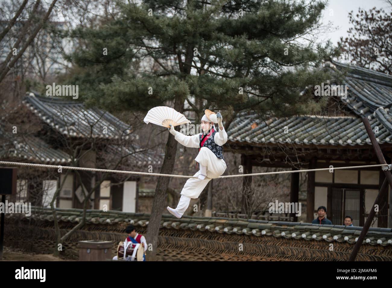Acrobatics on a Tightrope walking at Korean Folk Village on January 28, 2016 in Yongin, South Korea. Stock Photo