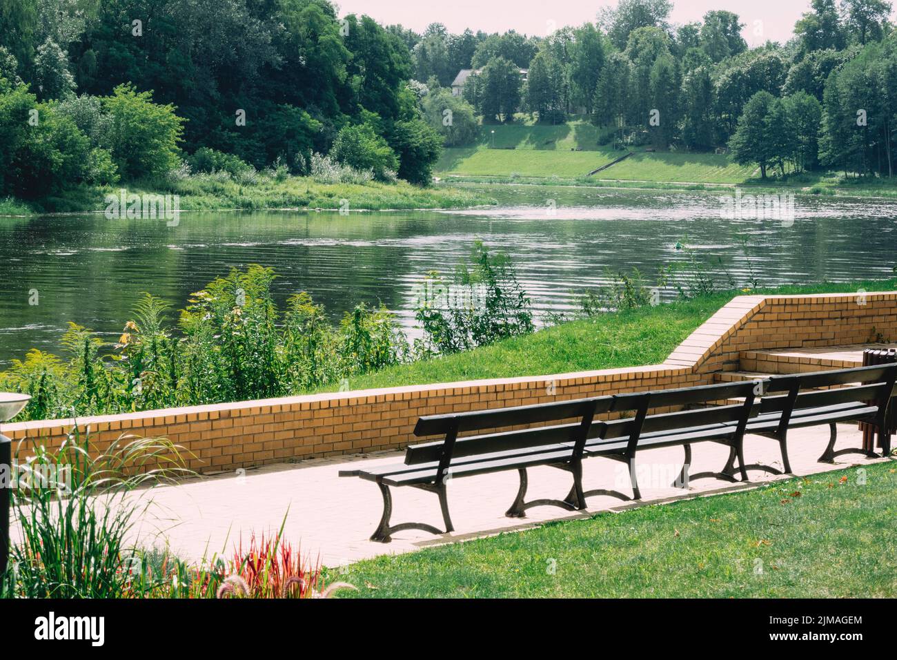 View to Nemunas river and embankment in Druskininkai. Lithuania. Druskininkai is resort with health promotion, recreation, active lifestyle Stock Photo