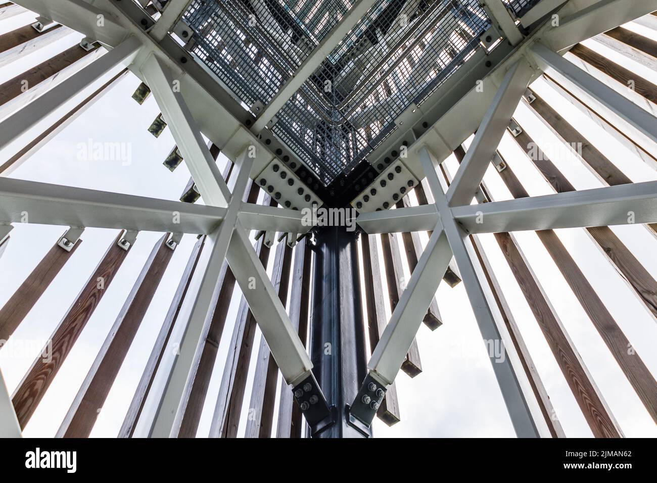 Massive industrial steel construction endtoend with bolts and nuts on