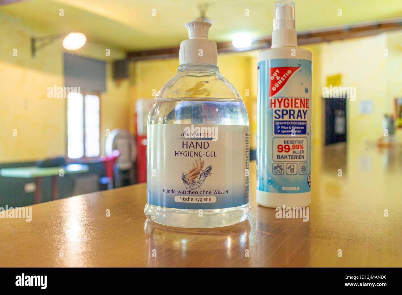 Neckargemued, Germany: July, 22. 2022: Several types of disinfectants on the counter of a venue with focus on the disinfectants Stock Photo