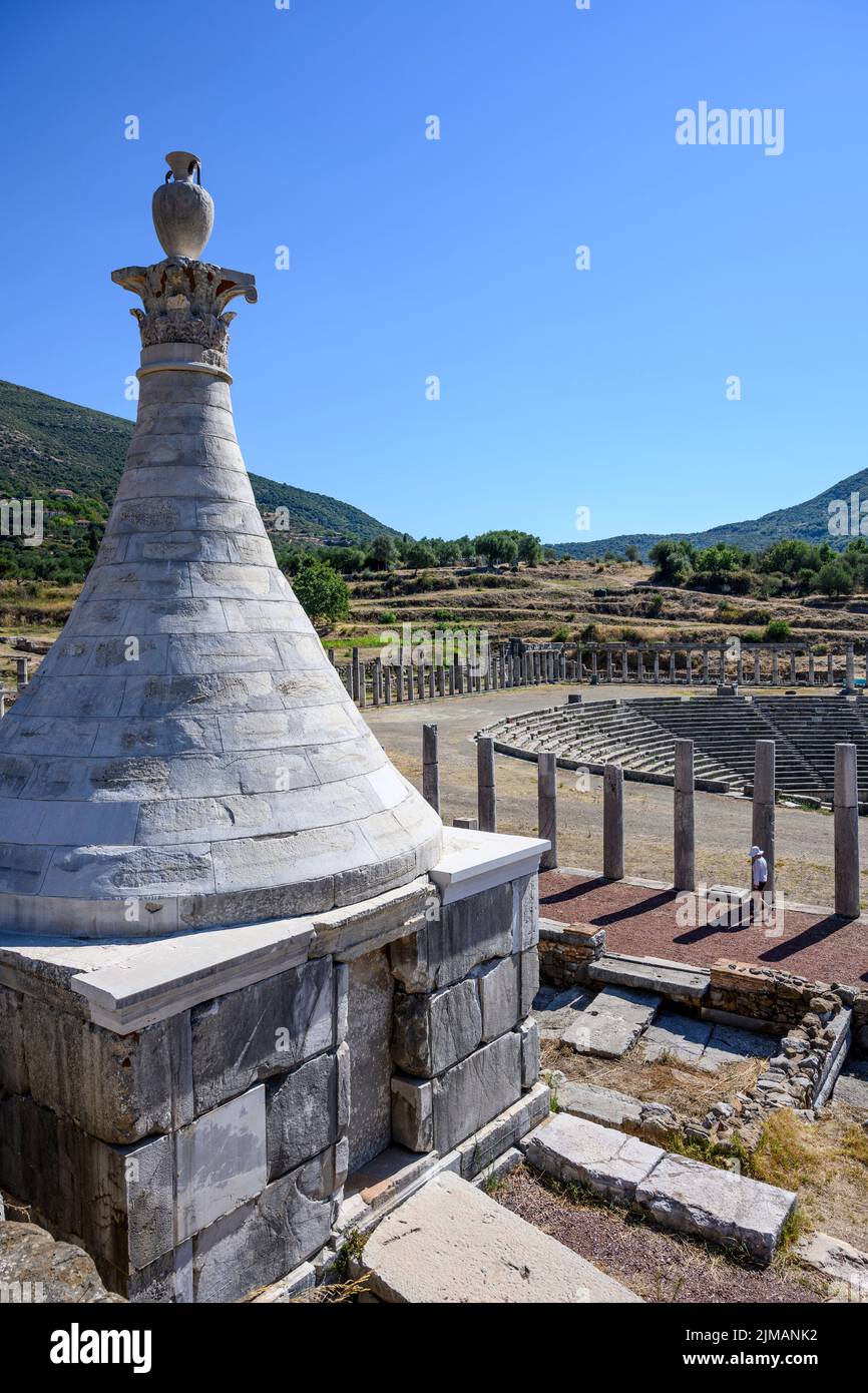 A 3rd cen. BC  grave monument  with a conical roof sits above the stadium, at Ancient Messene, Messinia, Peloponnese, Greece Stock Photo