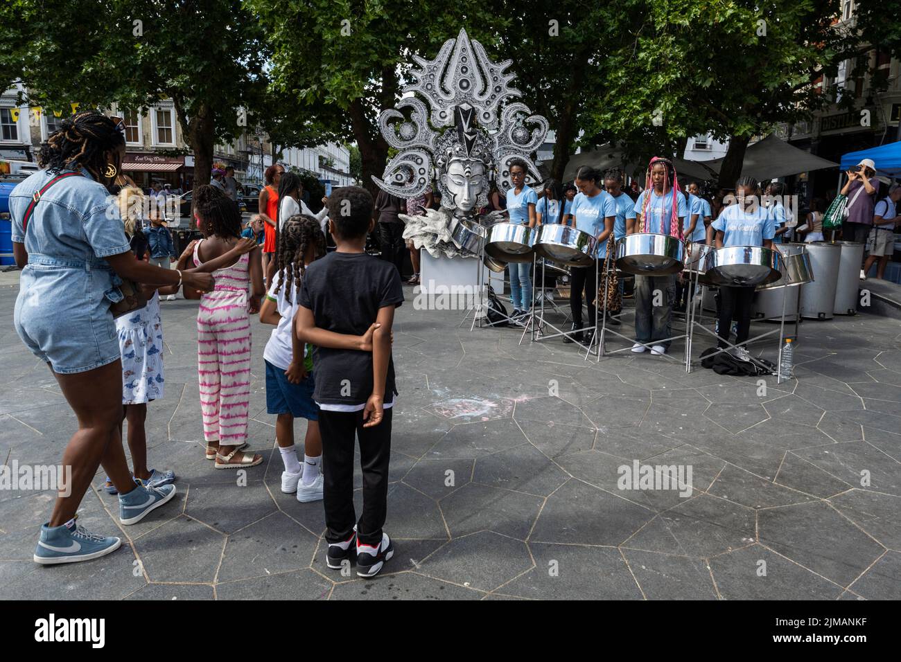 London, UK.  5 August 2022. The New Generation Steel Orchestra performs at Carnival in Chelsea, an event showcasing carnival costumes, music and culture.  The show is outside The Chelsea Theatre and is part of this year’s Kensington & Chelsea Festival. Credit: Stephen Chung / Alamy Live News Stock Photo