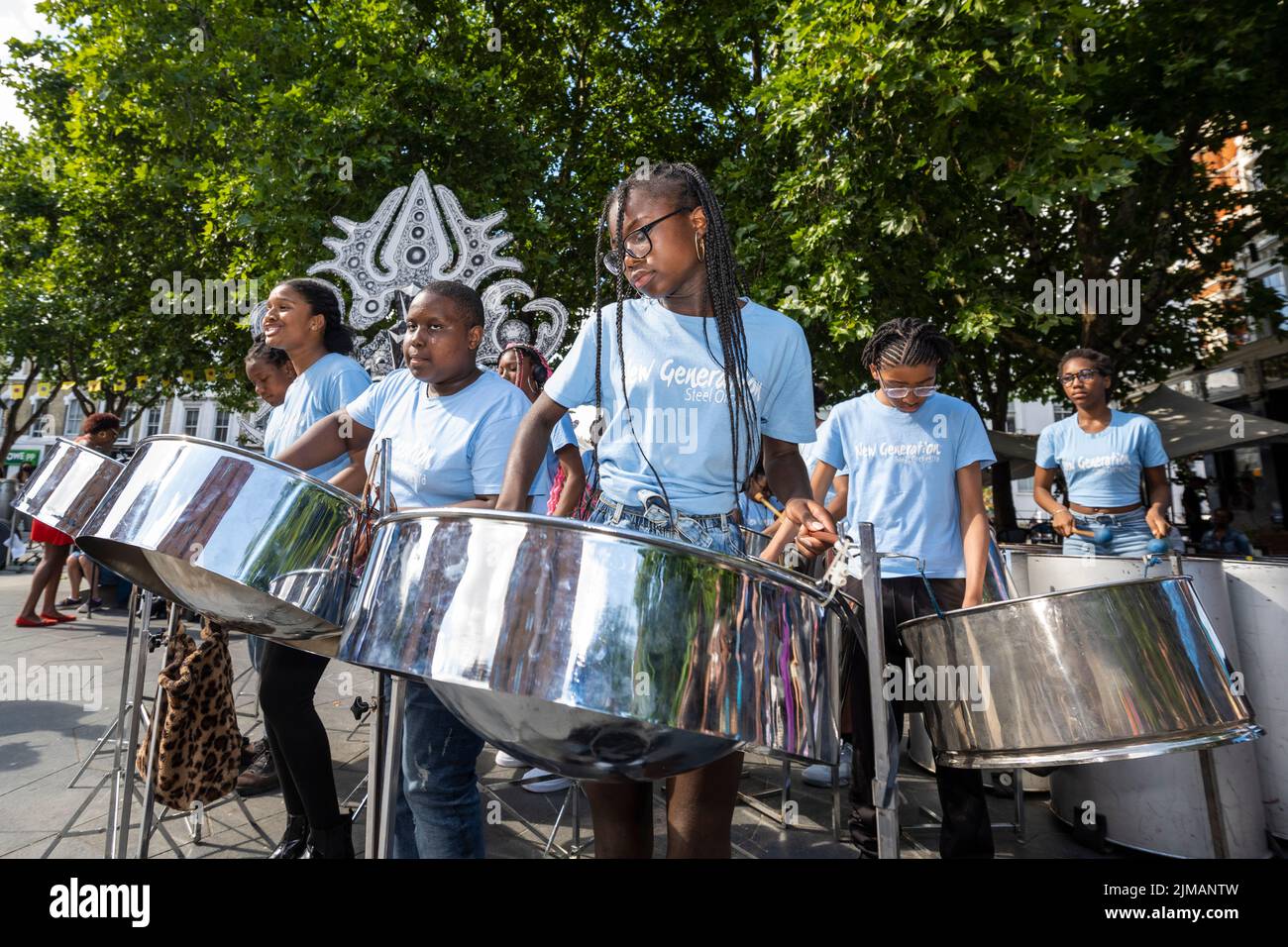 London, UK.  5 August 2022. The New Generation Steel Orchestra performs at Carnival in Chelsea, an event showcasing carnival costumes, music and culture.  The show is outside The Chelsea Theatre and is part of this year’s Kensington & Chelsea Festival. Credit: Stephen Chung / Alamy Live News Stock Photo