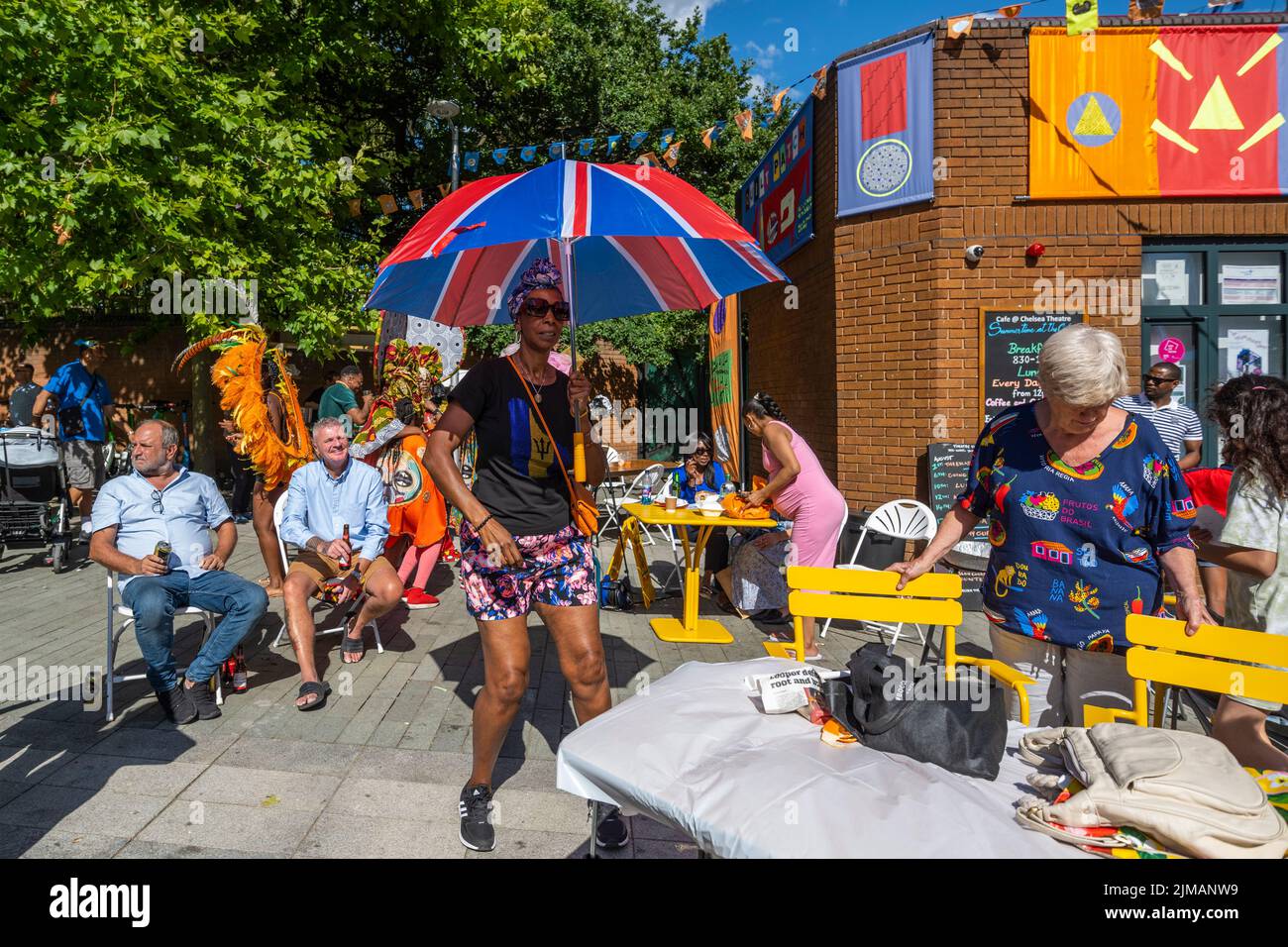 London, UK.  5 August 2022. Members of the public at Carnival in Chelsea, an event showcasing carnival costumes, music and culture.  The show is outside The Chelsea Theatre and is part of this year’s Kensington & Chelsea Festival. Credit: Stephen Chung / Alamy Live News Stock Photo