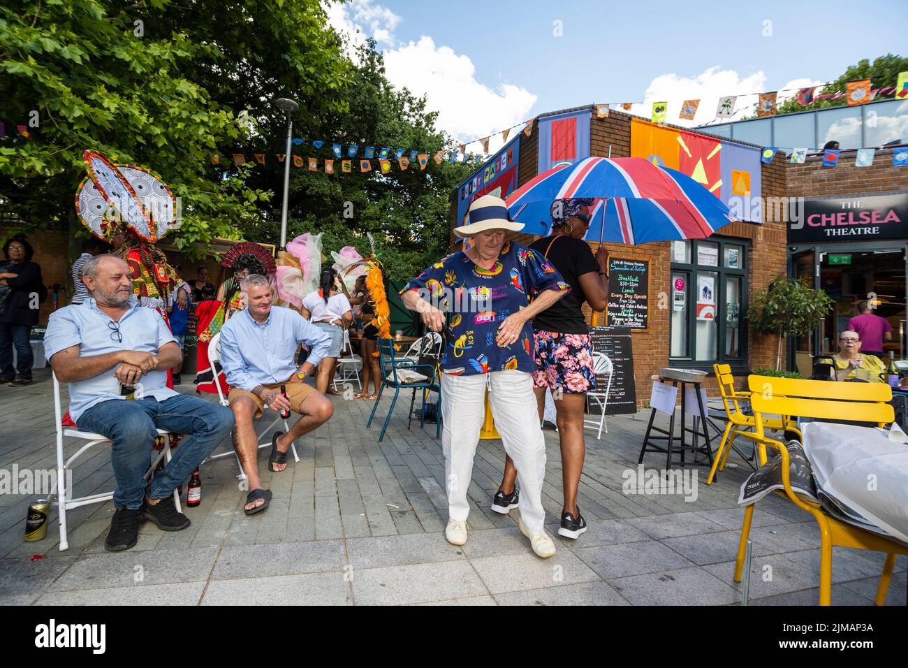 London, UK.  5 August 2022. Members of the public at Carnival in Chelsea, an event showcasing carnival costumes, music and culture.  The show is outside The Chelsea Theatre and is part of this year’s Kensington & Chelsea Festival. Credit: Stephen Chung / Alamy Live News Stock Photo