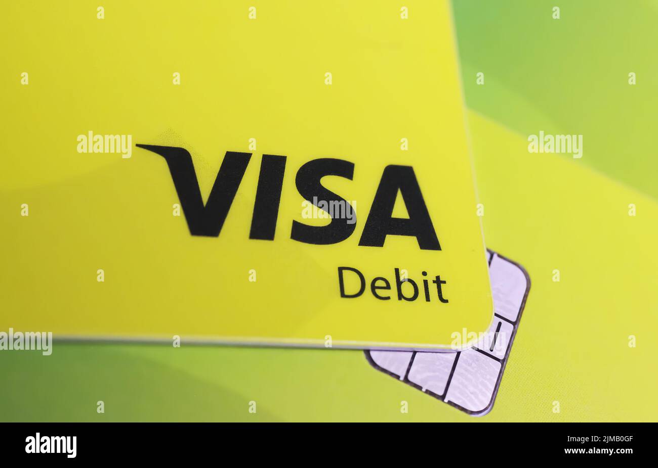 Versen, Germany - July 9. 2022: Closeup of yellow Visa debit credit card  Stock Photo - Alamy