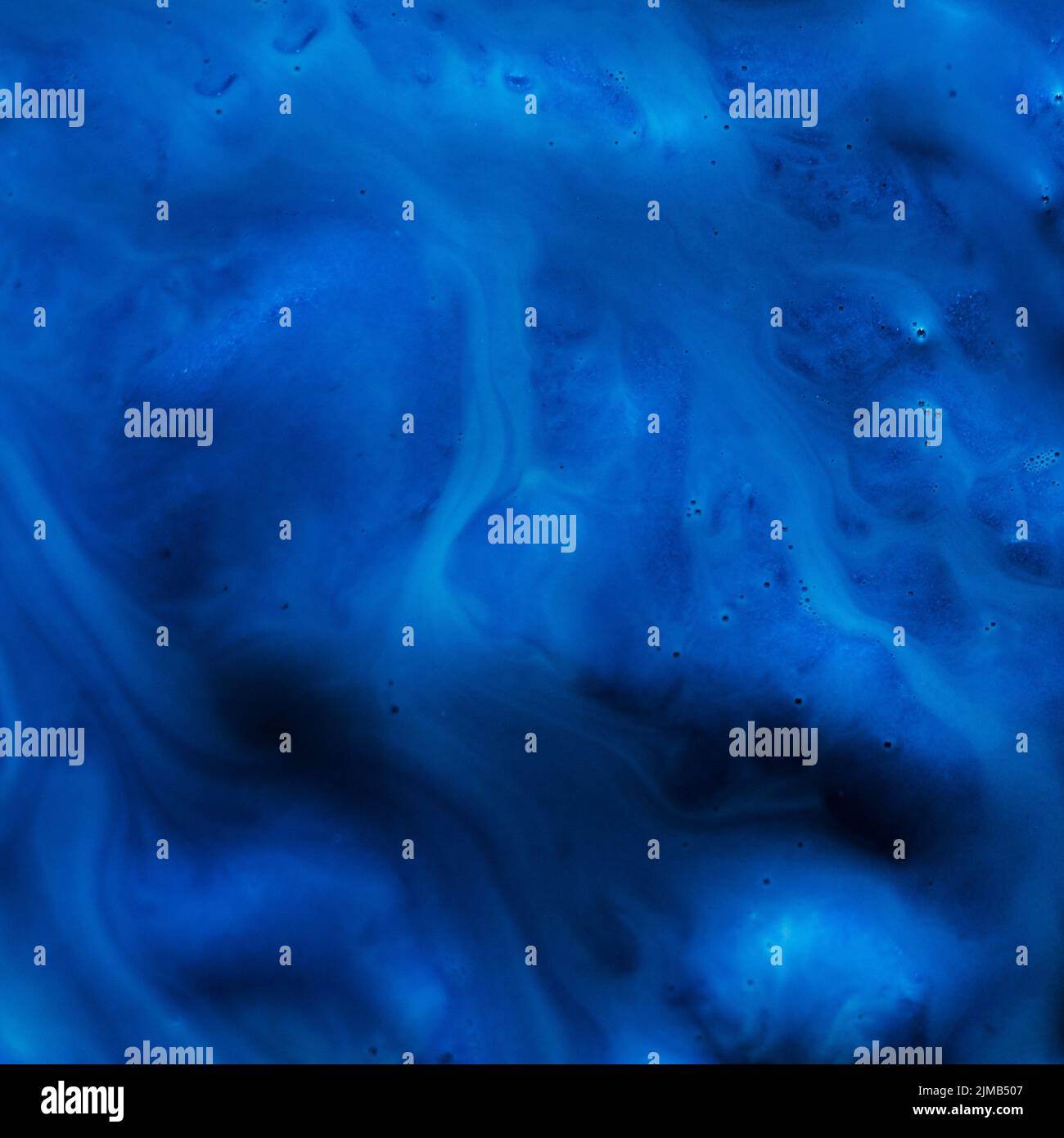 abstract blue paint background color fluid flowing Stock Photo