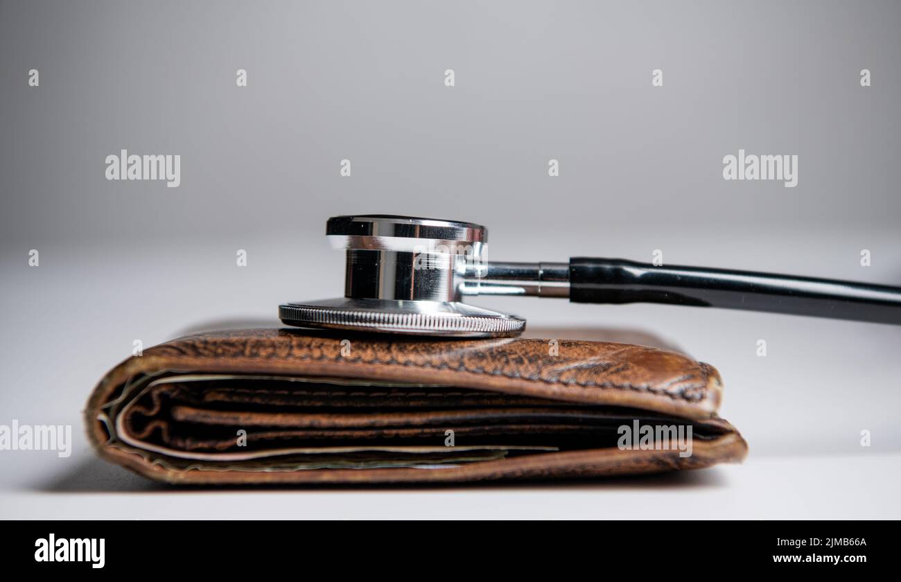 expensive medicine concept. stethoscope and wallet as symbol of