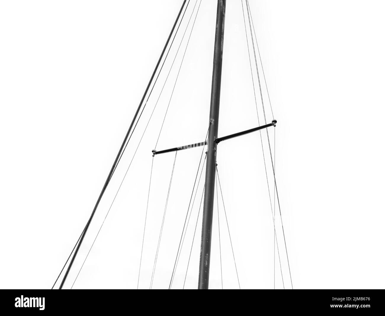 View of yacht mast with ropes, isolated on white background Stock Photo