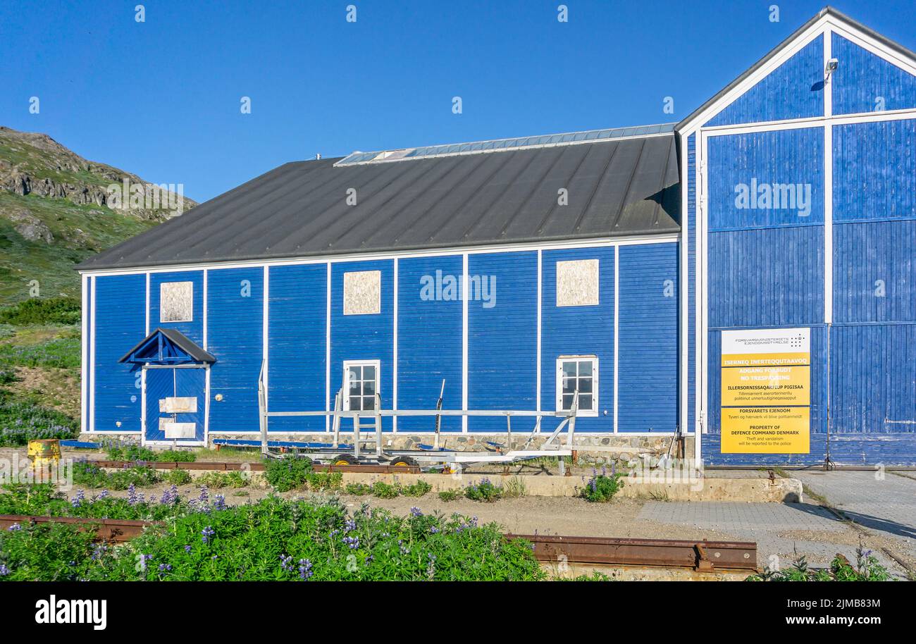 Defence Command Denmark  building and sign on blue wooden building at Grondalen, West Greenland on 21 July 2022 Stock Photo