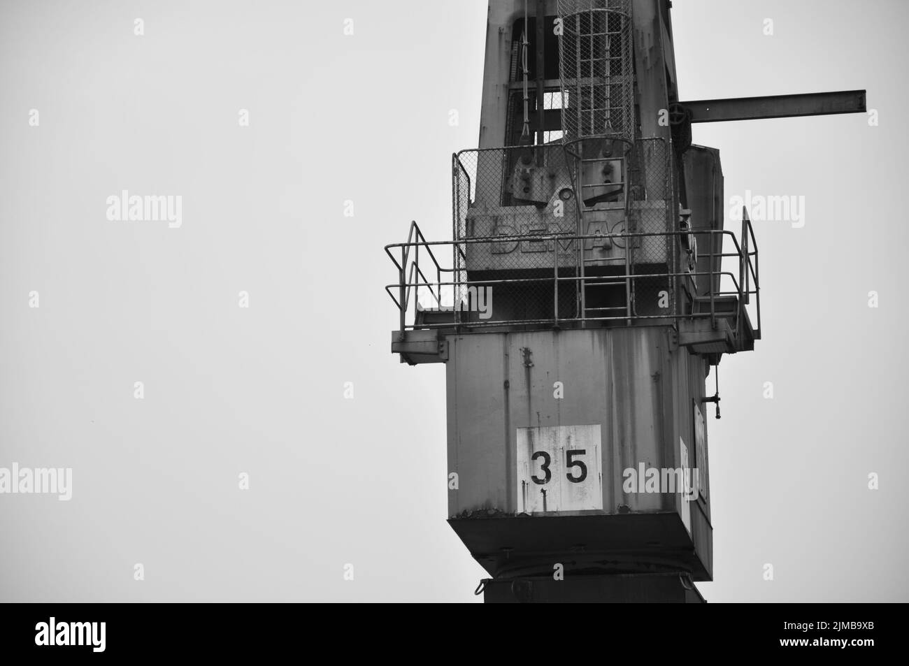 Harbour crane sky background Black and White Stock Photos & Images - Alamy