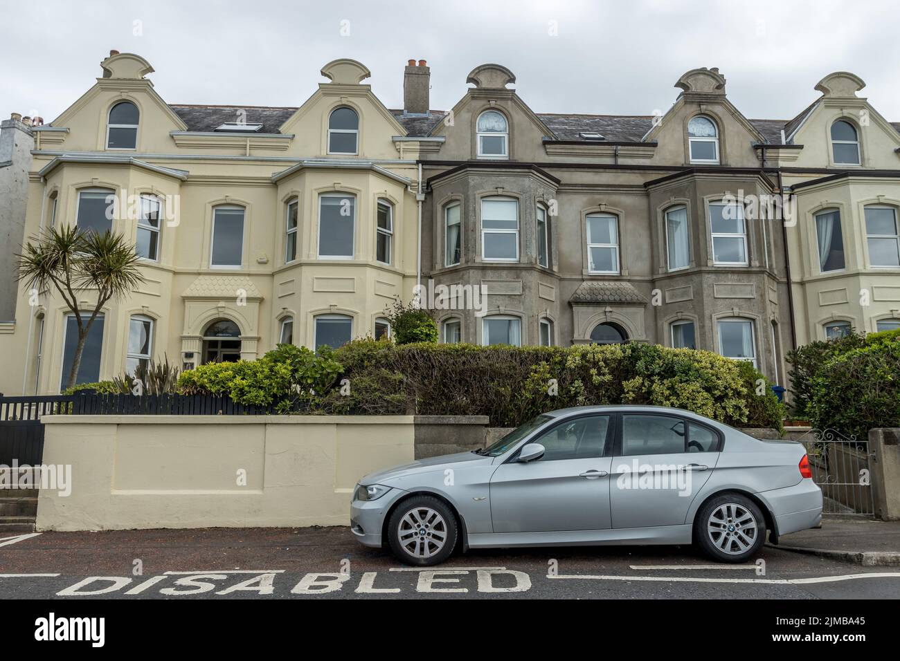 Beautiful buildings in Bangor with a parked car Stock Photo Alamy
