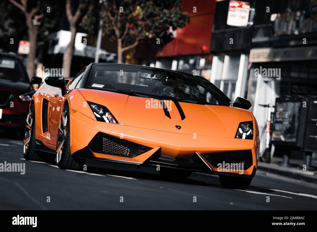 A orange Lamborgini at the streets of San Francisco in California, USA Stock Photo