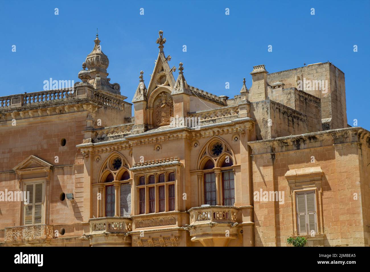 A big beautiful old house against blue sky background in Malta Stock ...