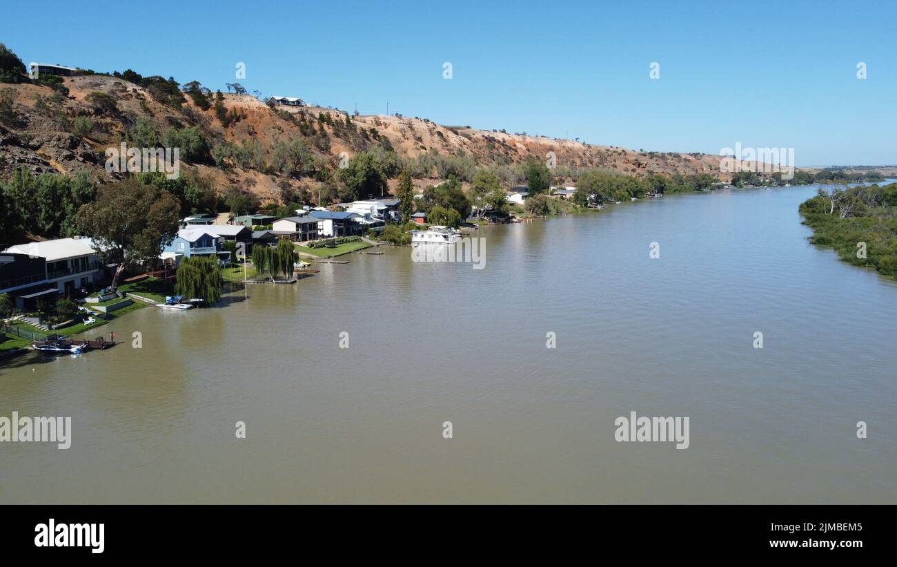 A closeup of the Murray River surrounded with trees and houses Stock Photo Alamy