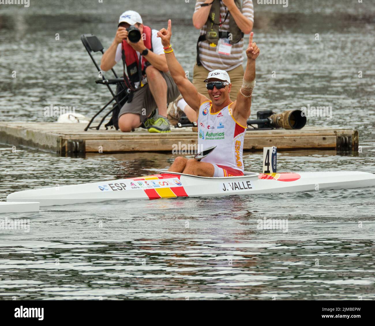 Dartmouth, Canada. August 5th, 2022 Juan Valle from Spain celebrates winnig Gold in the Men Paracanoe KL3 200m World Championships in a photofinish with 0.08 seconds between Gold and Bronze. Robert Oliver from Great Britain takes Silver and Dylan Littlehales from Australia took bronze. The 2022 ICF Canoe Sprint and Paracanoe World Championships takes place on Lake Banook in Dartmouth (Halifax). Credit: meanderingemu/Alamy Live News Stock Photo