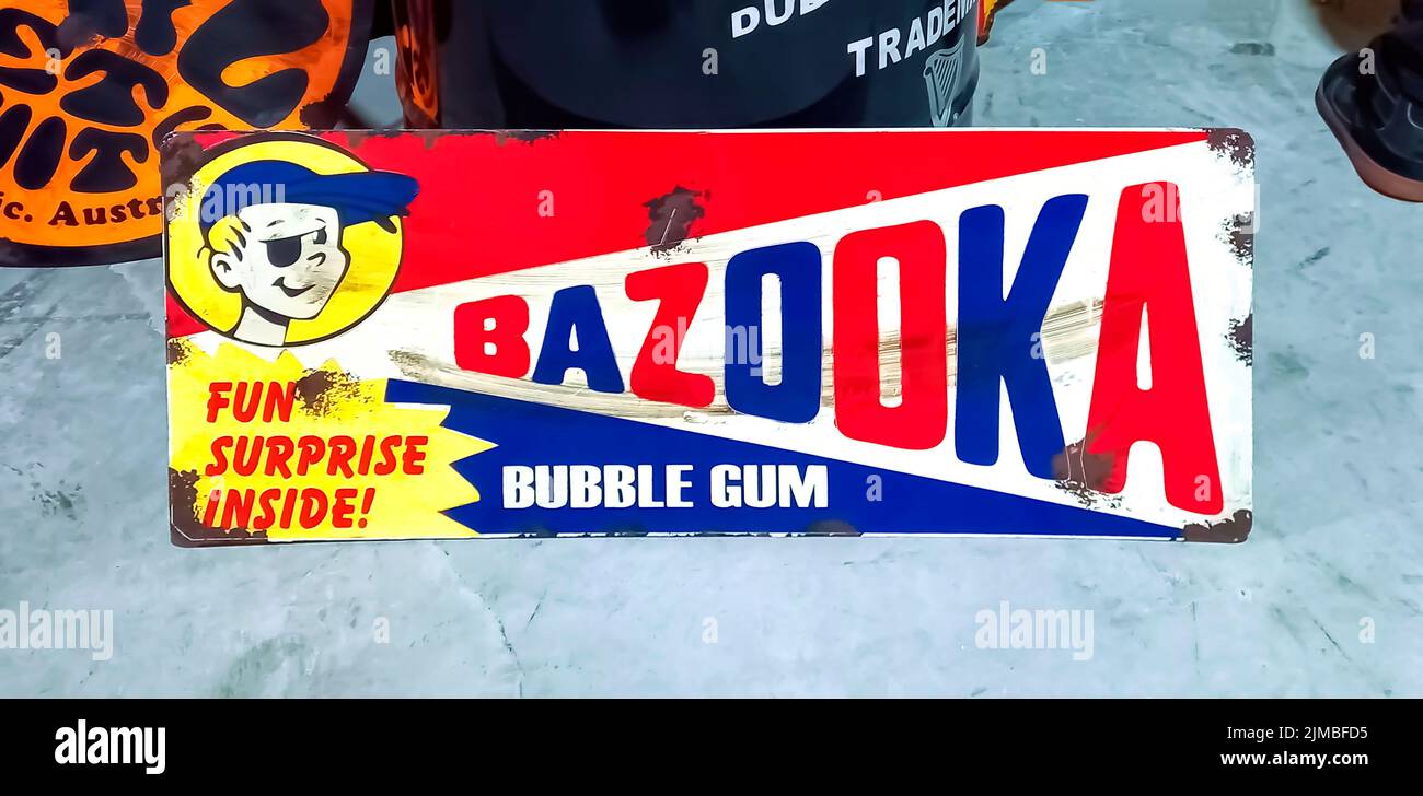 Old dirty rusty advertisement sign logo. Bazooka is an American brand of bubble gum introduced in 1947. Stock Photo