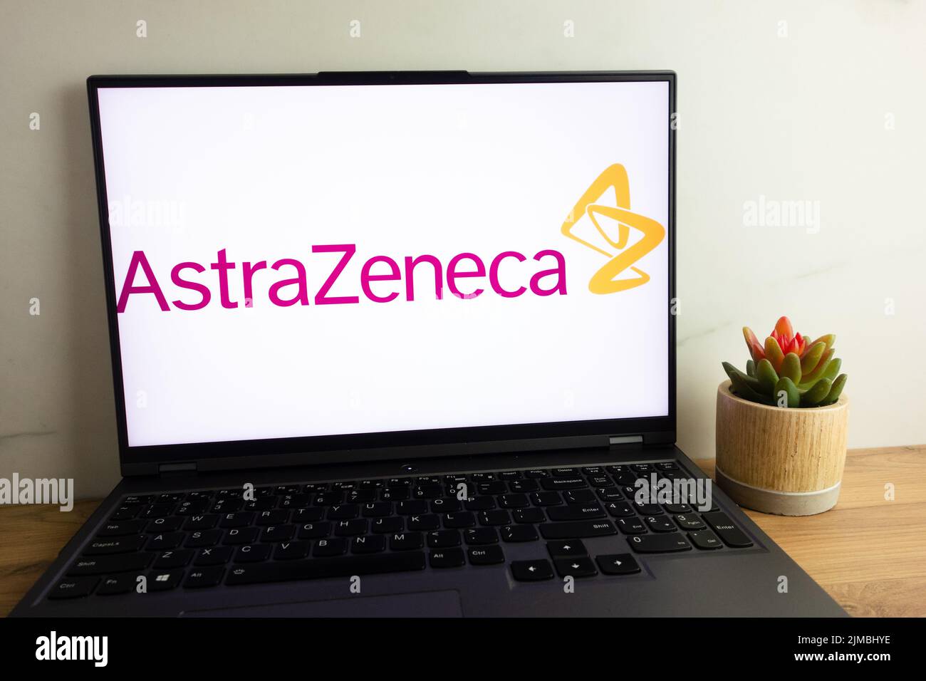 KONSKIE, POLAND - August 04, 2022: AstraZeneca plc British-Swedish multinational pharmaceutical and biotechnology company logo displayed on laptop com Stock Photo