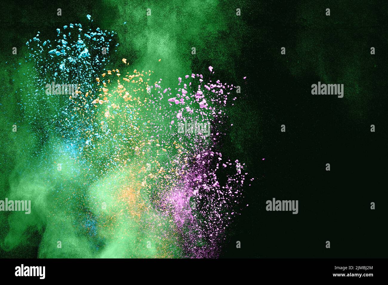 Multicolored powder explosion on white background. Color dust particle