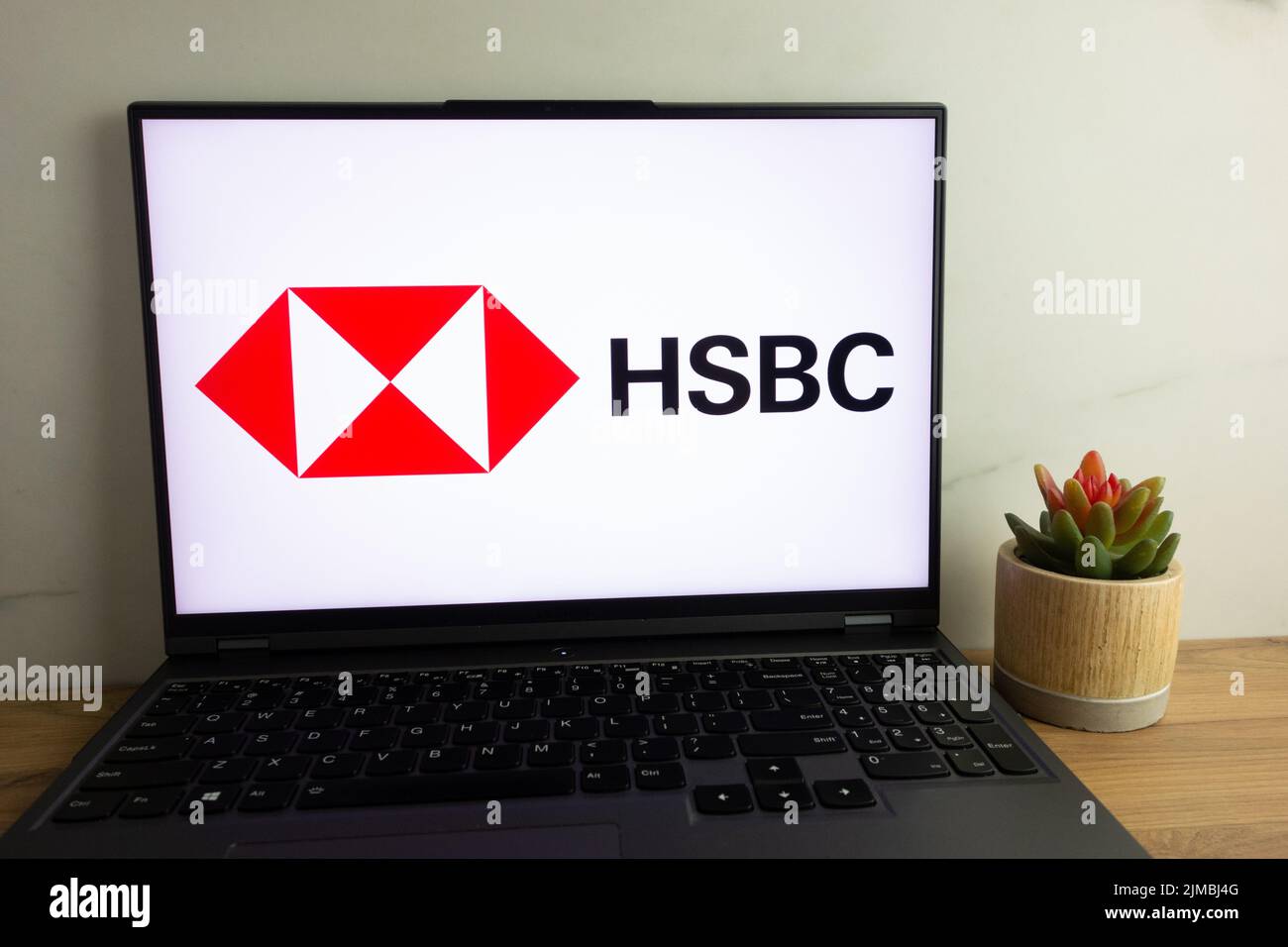 KONSKIE, POLAND - August 04, 2022: HSBC Holdings plc British multinational universal bank and financial services holding company logo displayed on lap Stock Photo