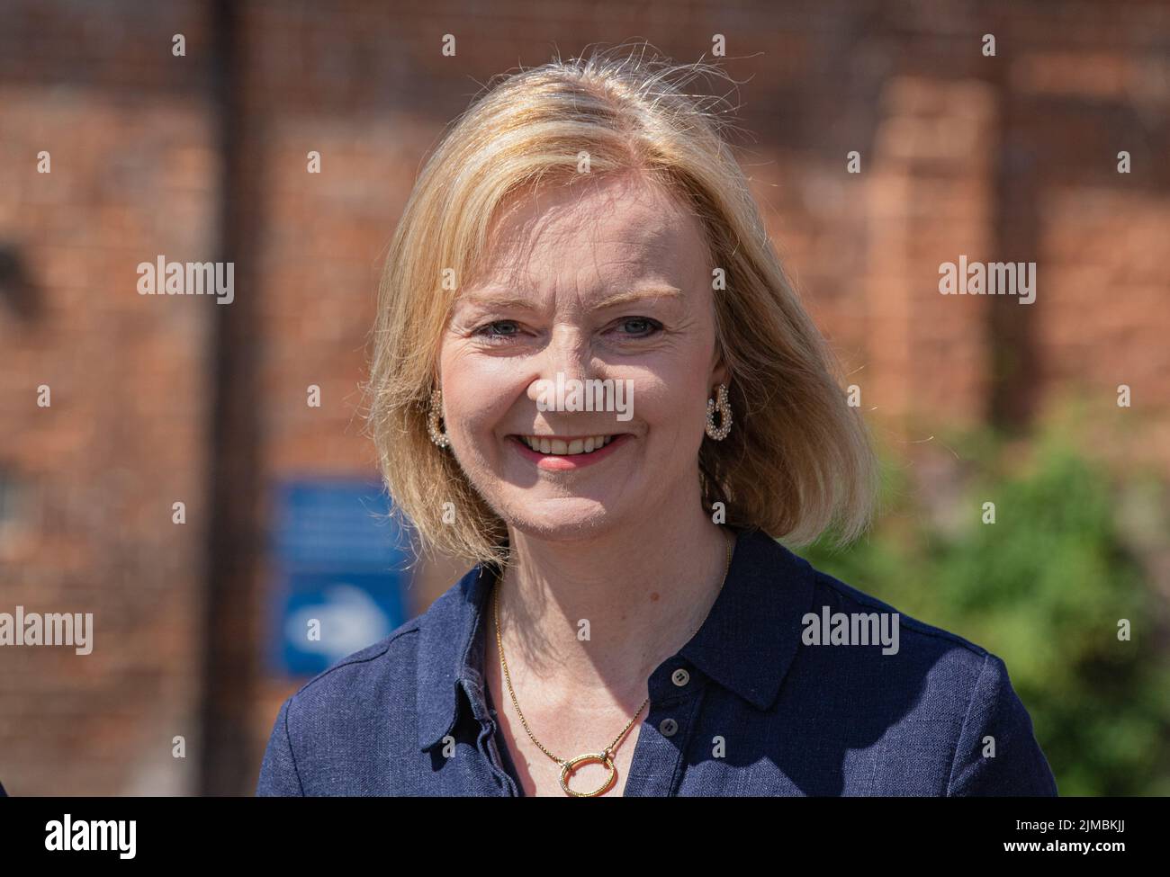 Rt Hon Elizabeth Truss MP , campaigning to become the leader of the Conservative Party and the next Prime Minister . A rare sight , she is smiling. Stock Photo