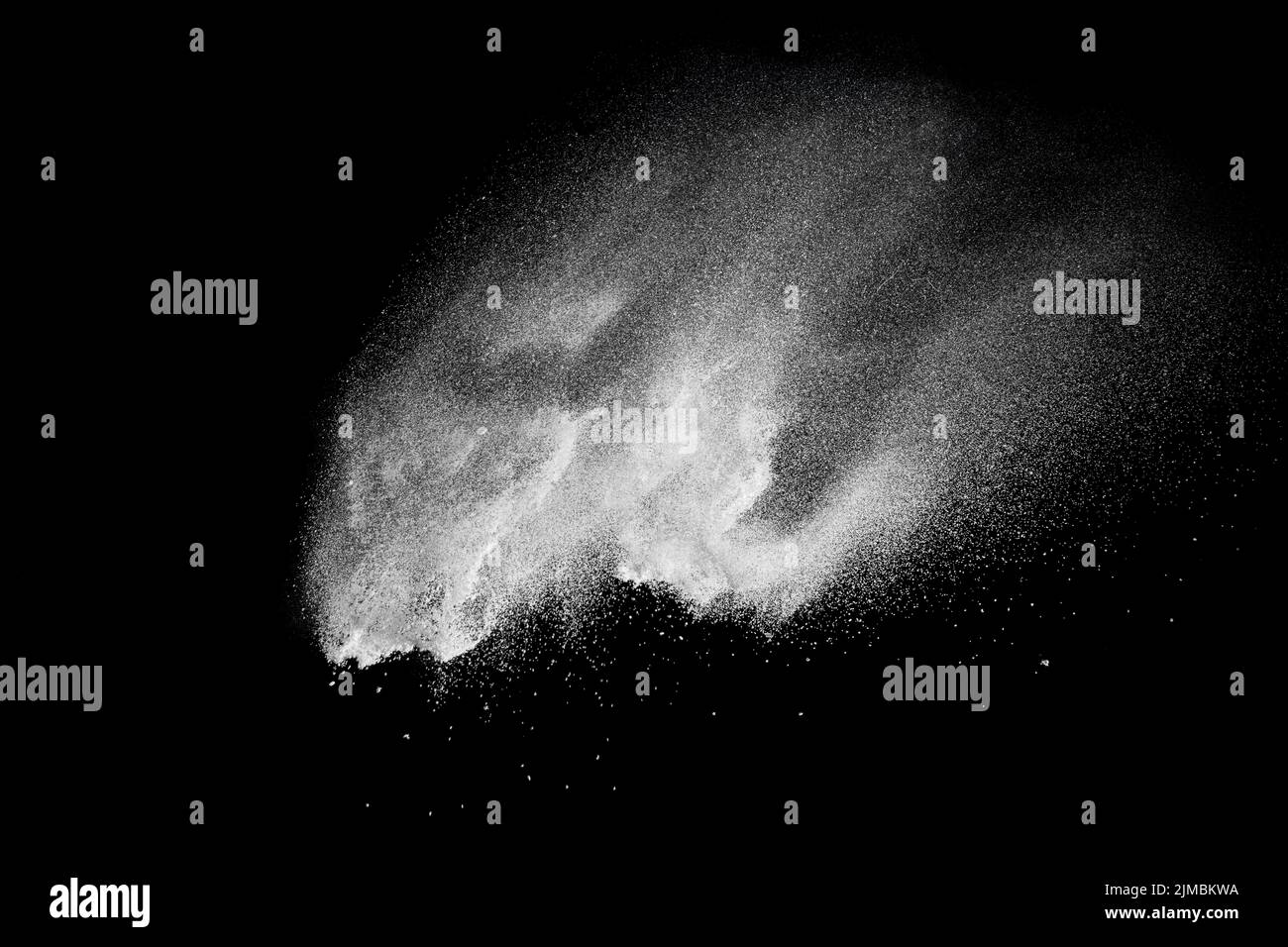 Bizarre forms of white powder explosion cloud against black background