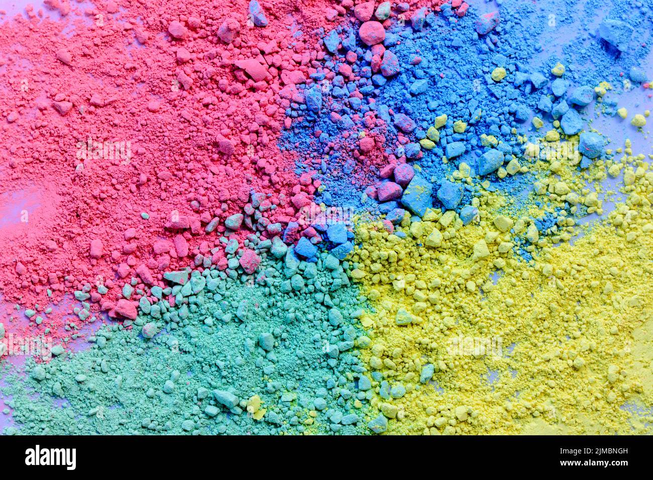 Colorful background of chalk powder. Multicolored dust particles