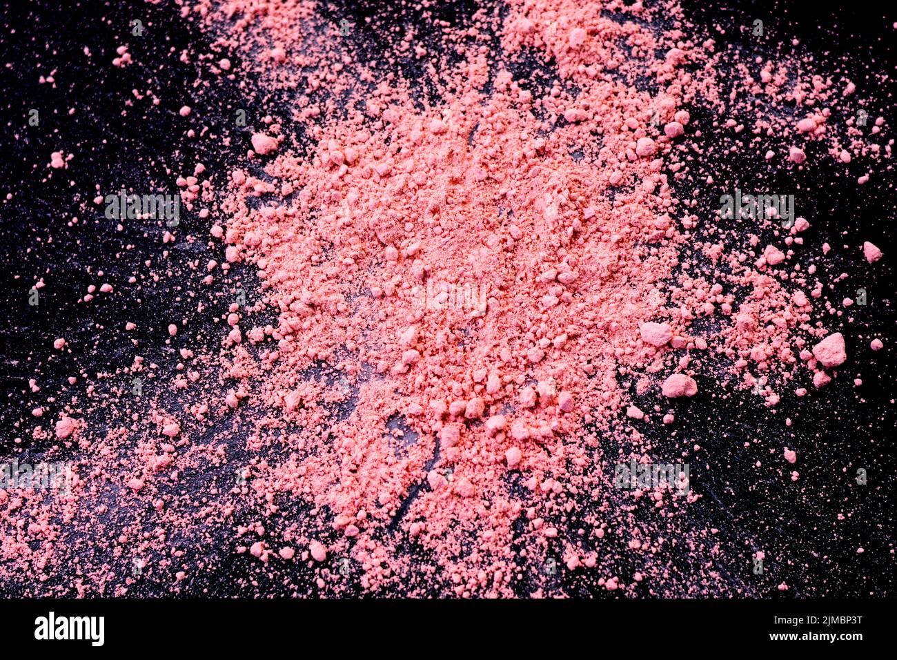 Pink color background of chalk powder. Pink color dust particles