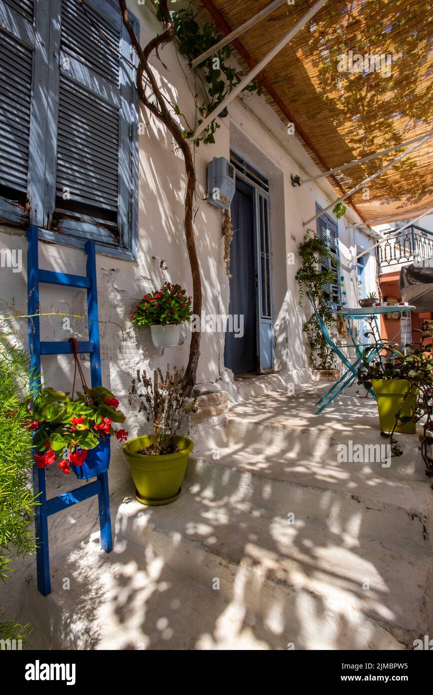 beautiful shaded patio outside of a typically greek house in the summer