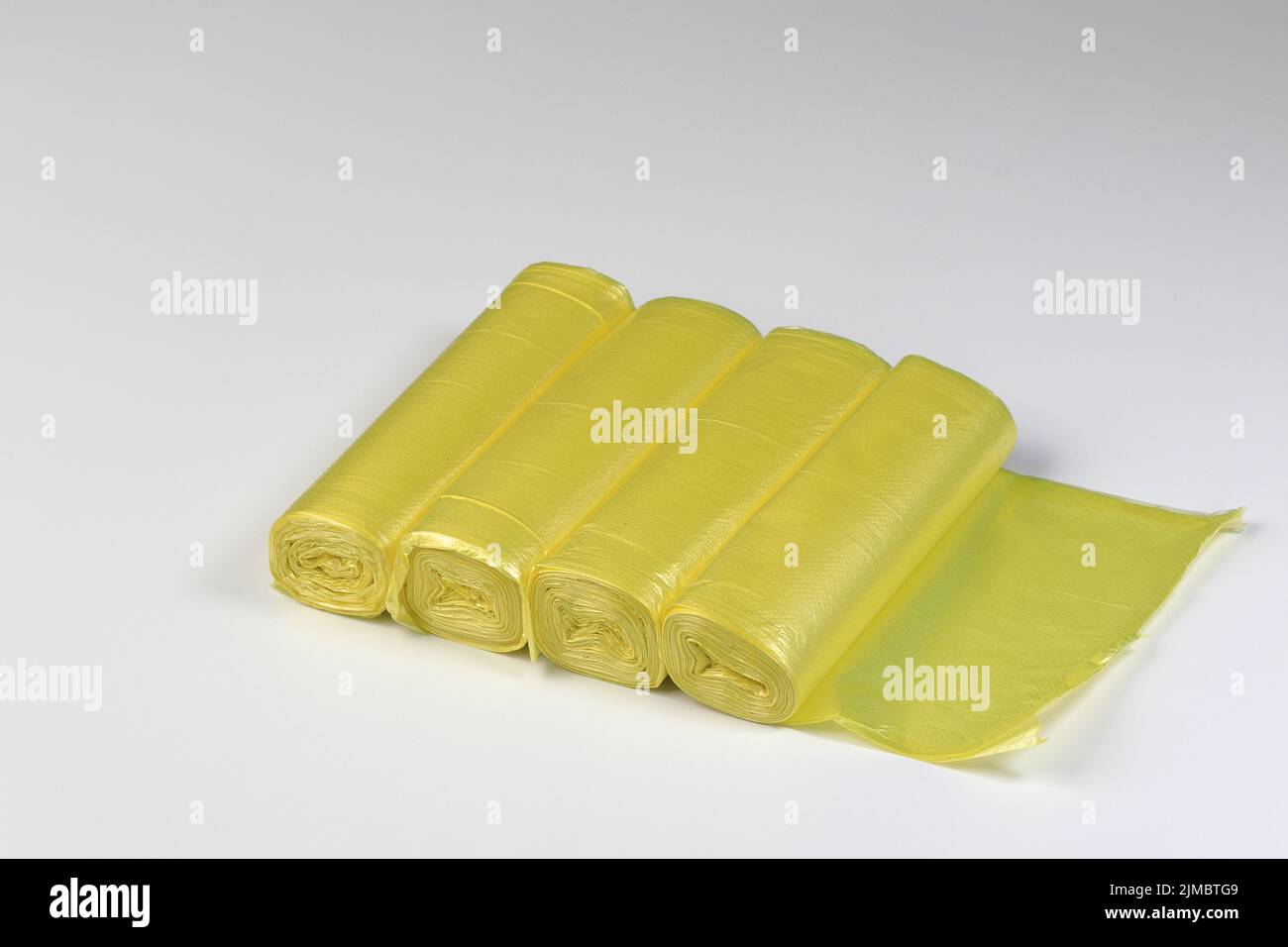 Yellow garbage bag hi-res stock photography and images - Alamy