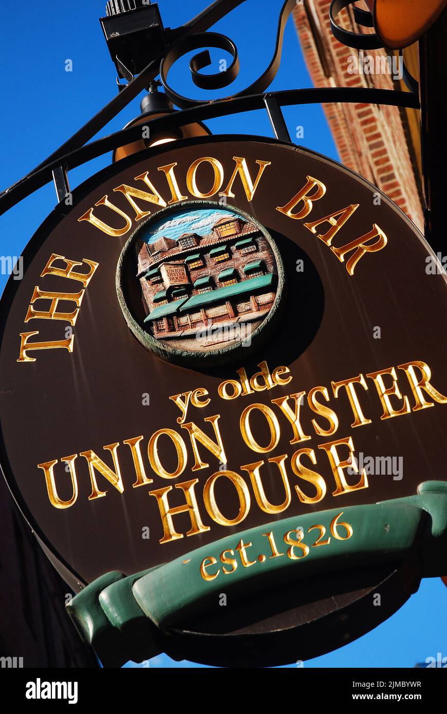A sign hangs on the outside of the ye Olde Oyster House, one of the Oldest Restaurants in America, on a sunny day in Boston Stock Photo