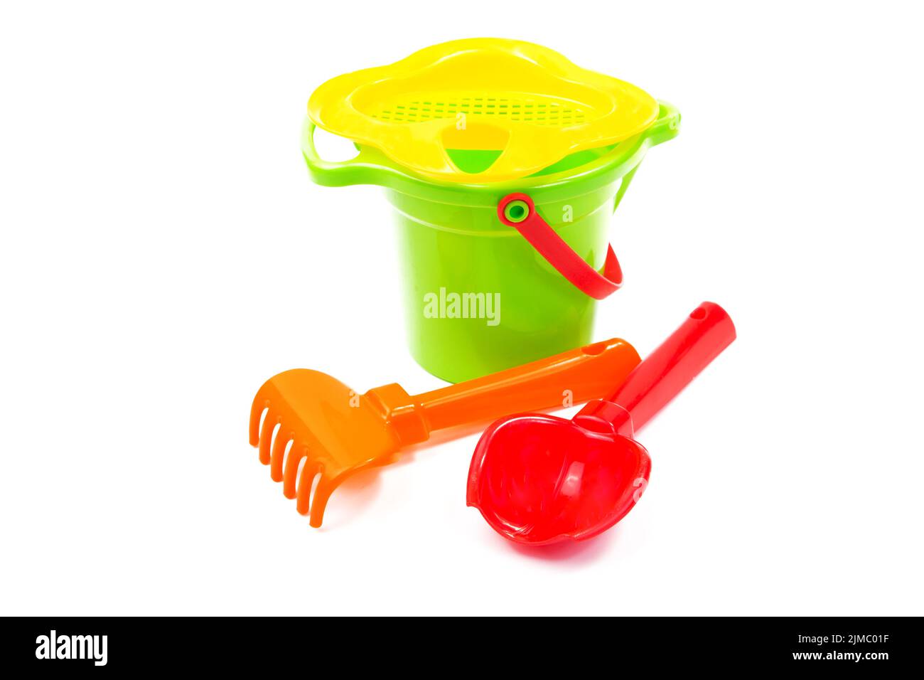 Children's toys bucket shovel and rake isolated on the white Stock