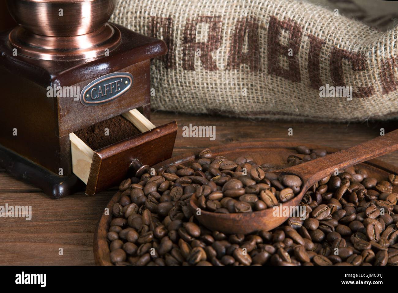 Coffee beans with a burlap and wooden spoon Stock Photo
