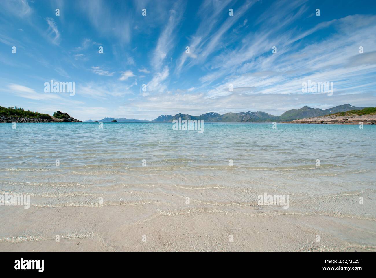 A stunning seascape of Rorvikstranda white sand beach in Lofoten ...