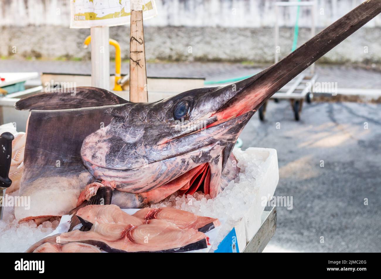 Swordfish for sale at local outdoor market Stock Photo